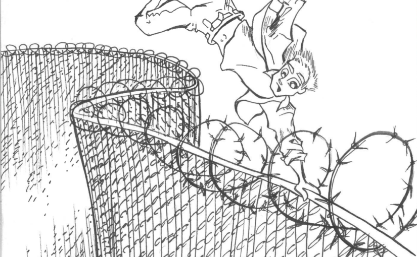 A young man is vaulting over a tall, barbed wire fence, as one would expect to see along the U.S.-Mexico border.